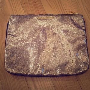 Gold over-sized clutch